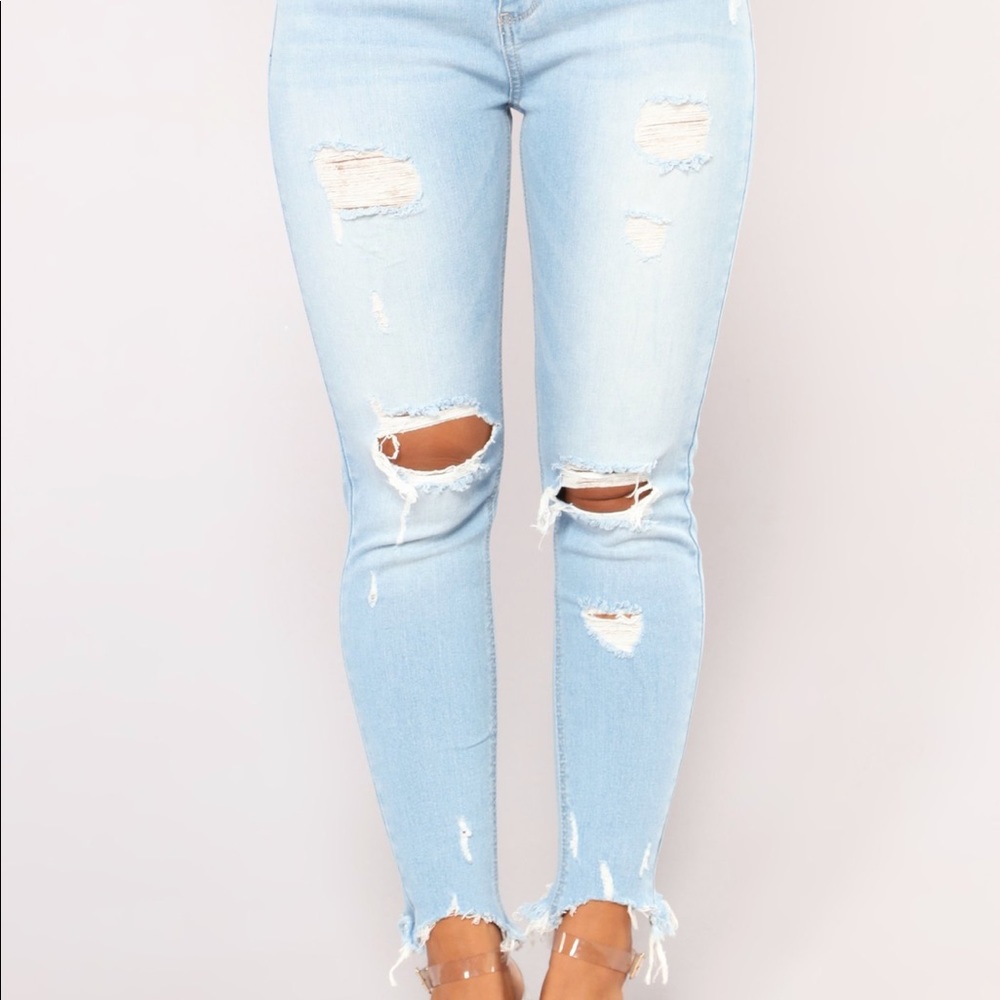 Mid Rise Distressed Ankle Jeans